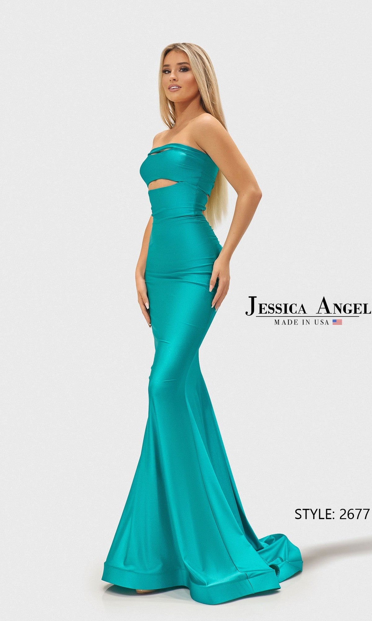 A woman poses in the fitted, strapless Jessica Angel 2677 long prom dress, featuring a mermaid silhouette and cutout below the bust. The seafoam gown displays